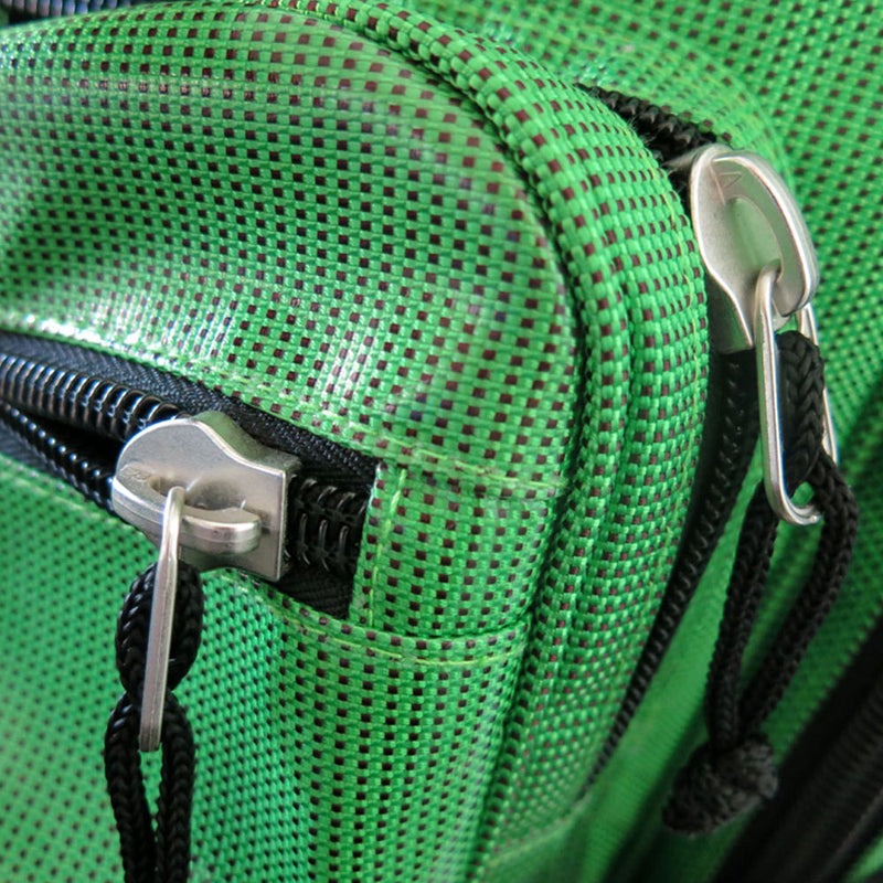 closeup of zipper pulls on green bag